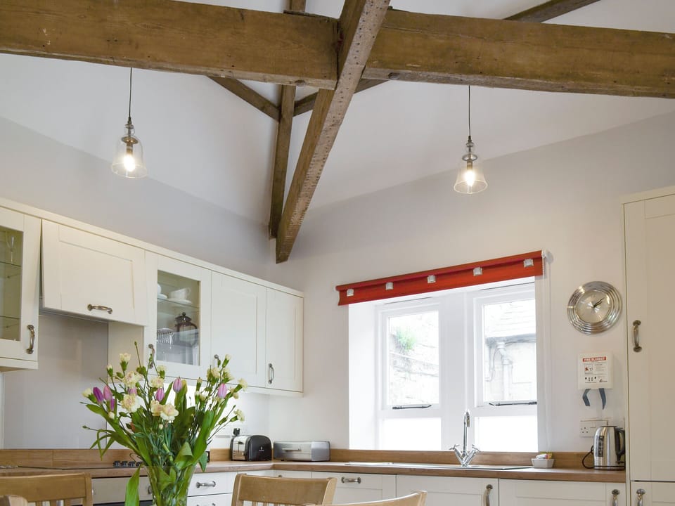 Traditional exposed wood beams in kitchen | The Coach House - The Grange, Whittingham near Alnwick