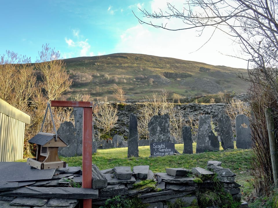 Garden with countryside views | Bryn Rhos Goch, Cwm Penmachno, near Betws-y-Coed
