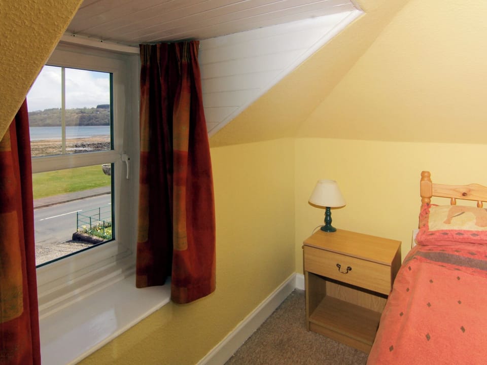 Bedroom with sea view | Ivybank Cottage, Lamlash, Isle of Arran