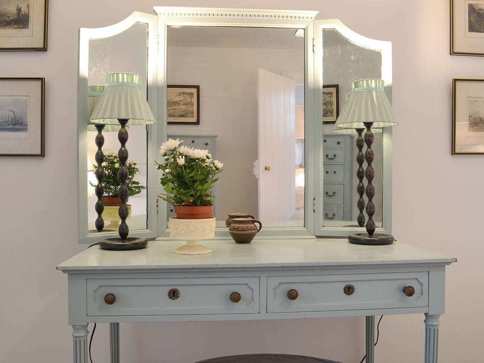 Double bedroom with charming dressing table | Garden Cottage, Strachur, near Dunoon