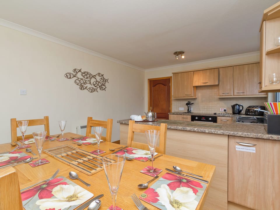 Spacious kitchen and dining area | Loch Duich Cottage, Inverinate, by Kyle