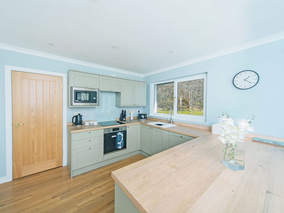 Spacious kitchen and dining area | Loch Duich Cottage, Inverinate, by Kyle