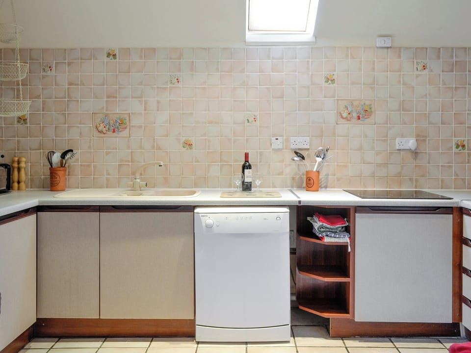 Well-equipped fitted kitchen | Rowan Tree Cottage, Glenisla