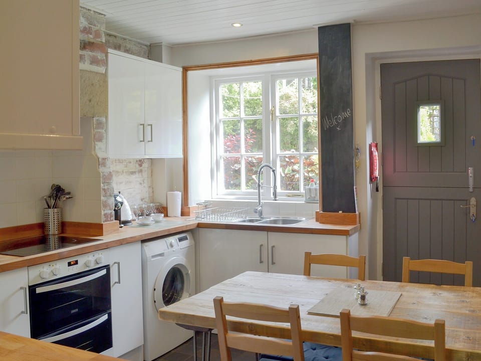 Quaint kitchen/ dining room | Pear Tree Cottage, Wirksworth, near Matlock
