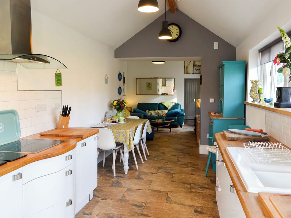 Well-equipped kitchen area and tiled floor | Bowji, Numphra, near Penzance
