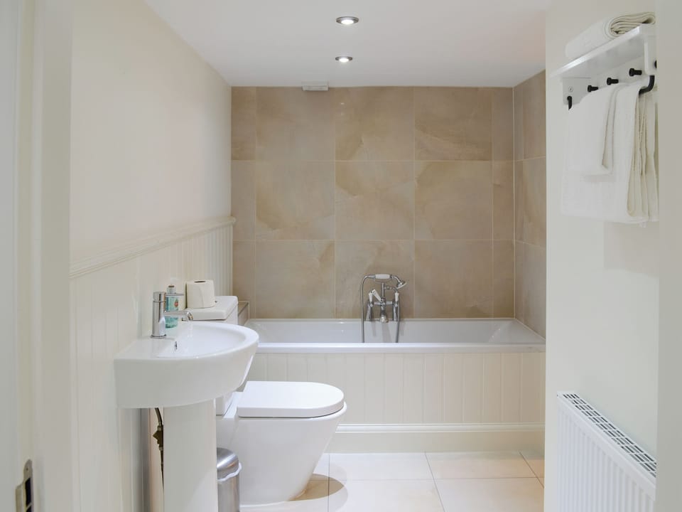 House bathroom with shower over bath | The Fish House - Rispond Estate, Rispond, near Durness