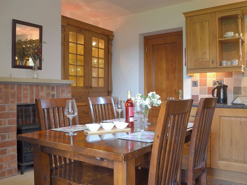 Stylish dining area within kitchen | Railway Cottage, Longcliffe, near Ashbourne