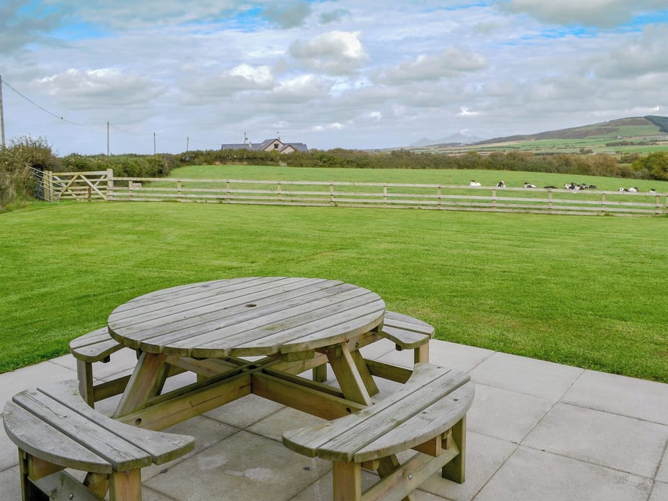 Sitting out area with far reaching views | Ty Hen, Llangwnnadl near Pwllheli