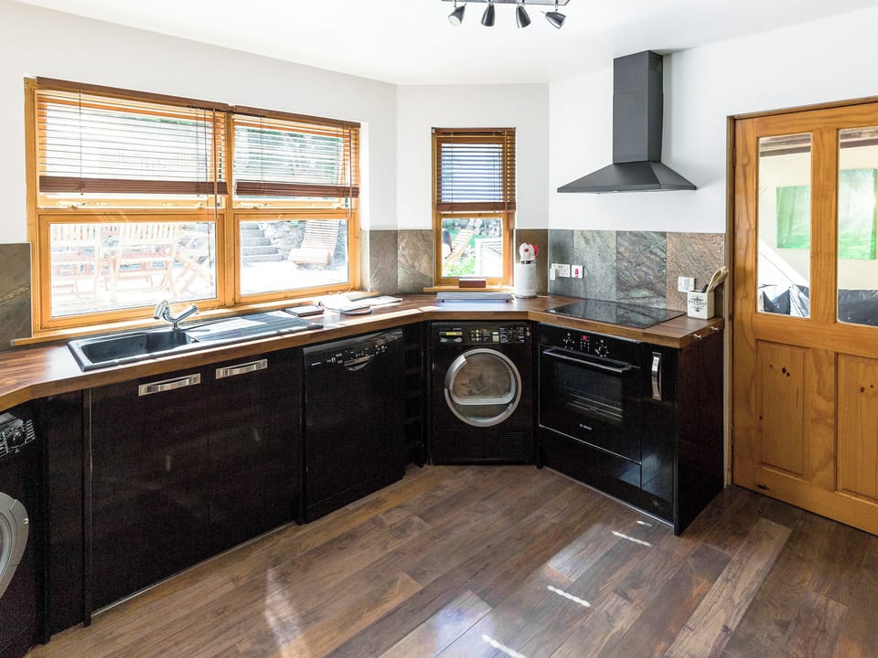 Well-equipped fitted kitchen | Fern Cottage, Ardentinny near Dunoon
