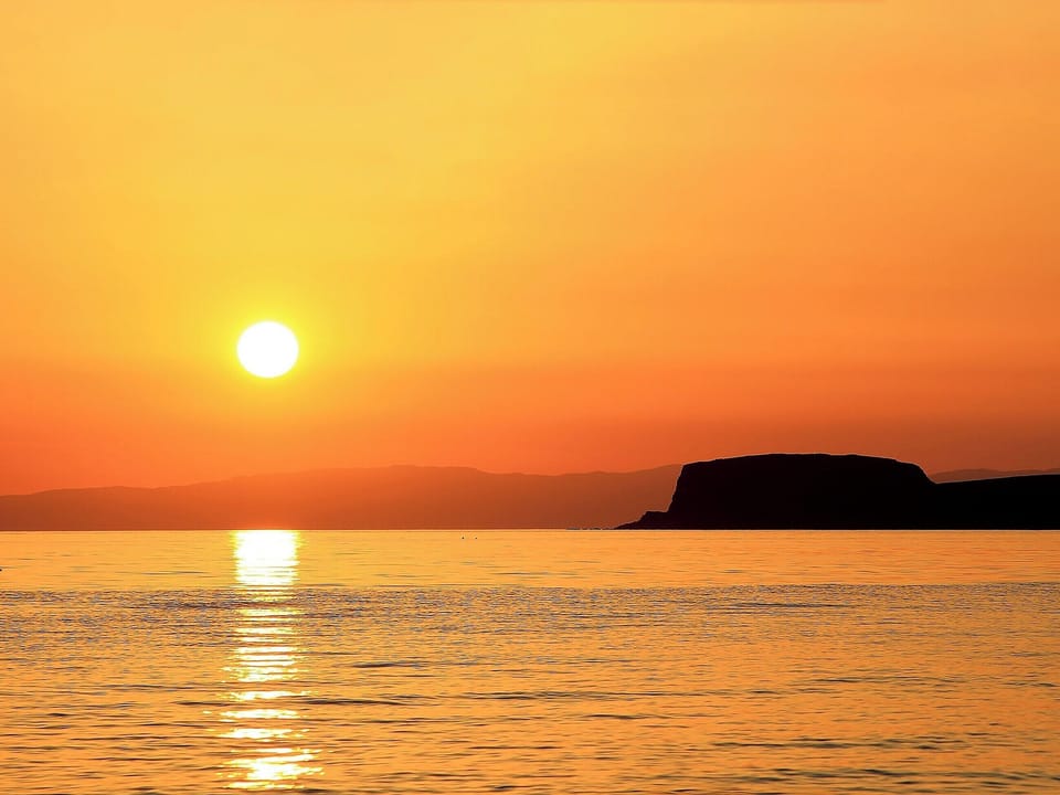 Spectacular sunsets can be enjoyed | Charlie&rsquo;s Cottage, Muasdale, near Campbeltown