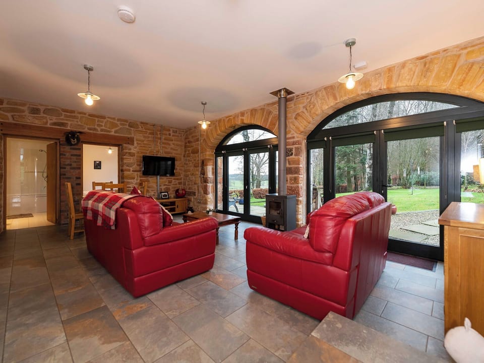 Tile-floored living area with far-reaching views | Cart Shed, Mauchline, near Ayr
