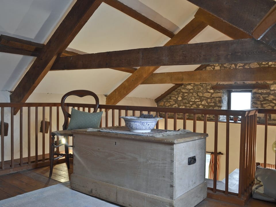 Gallery area with futon bed | Ty Christian, Caerwedros, near New Quay