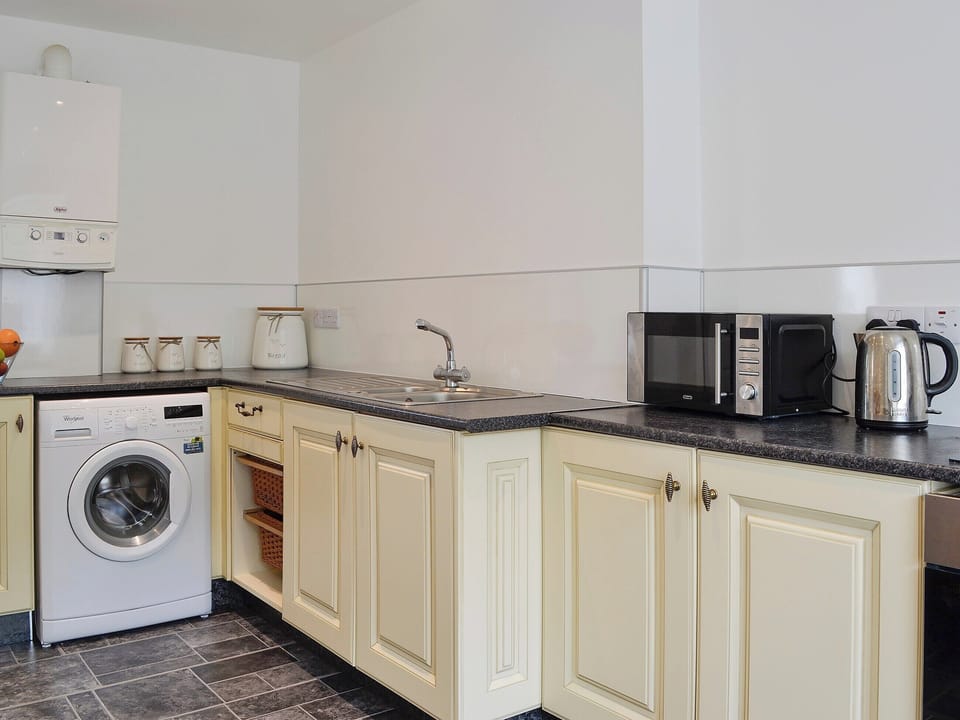 Well-appointed kitchen | Kirroughtree Steading 1 - Kirroughtree Steading Holidays, Newton Stewart