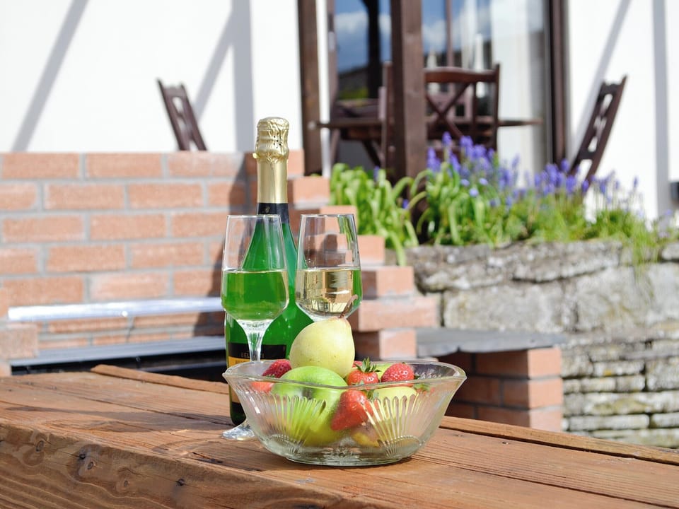 Outdoor seating on the gravelled patio | Three Views Bungalow, Talgarth, near Hay-on-Wye