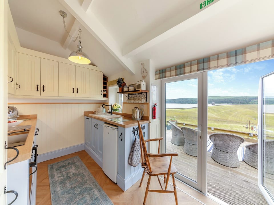 Farmhouse style kitchen with tiled floor | Lake View Cottage, Yarrow Moor, near Bellingham