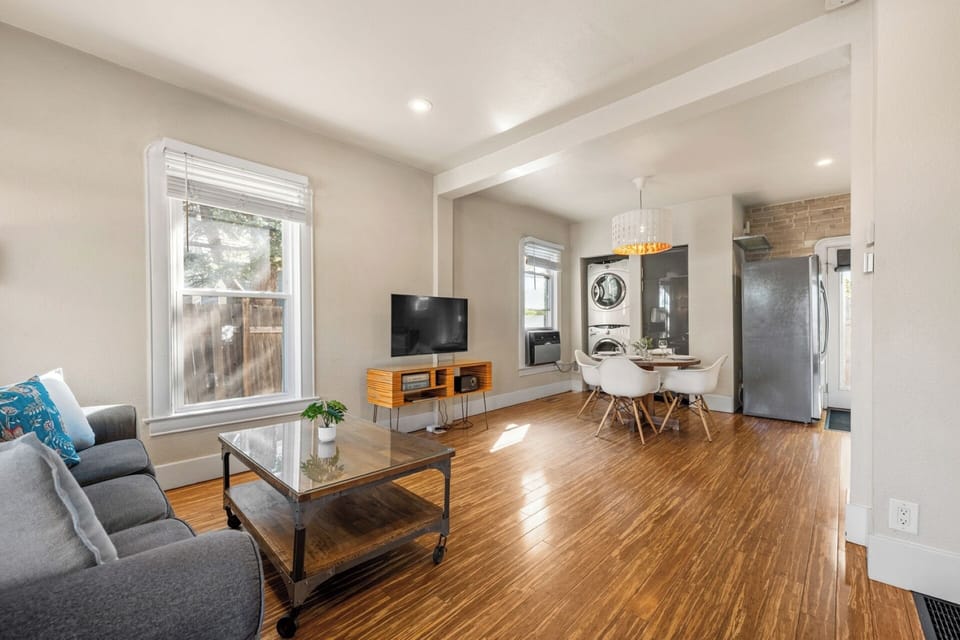 Relaxing living space with natural light, Queen sofa sleeper, Smart TV, Games