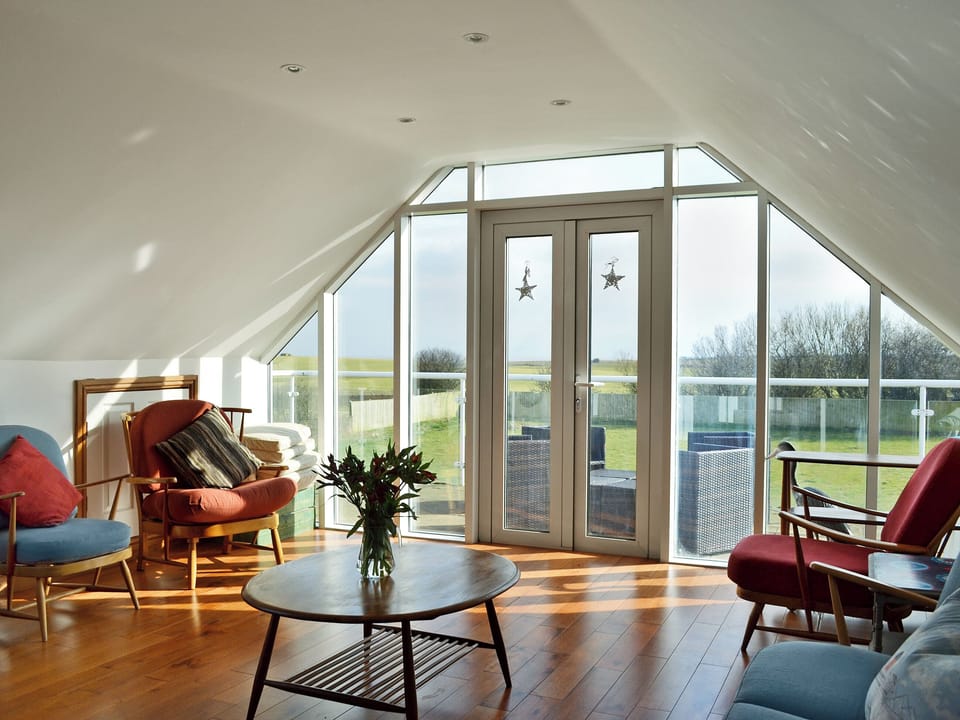 Impressive sitting room with balcony | Hamilton Lodge, Barmston, near Bridlington