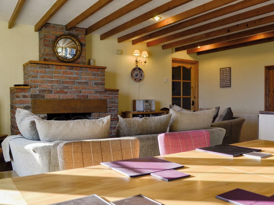 Charming open plan living space with beamed ceiling | Meadow Croft - The Crofters Cottages, Llangeinor, near Bridgend
