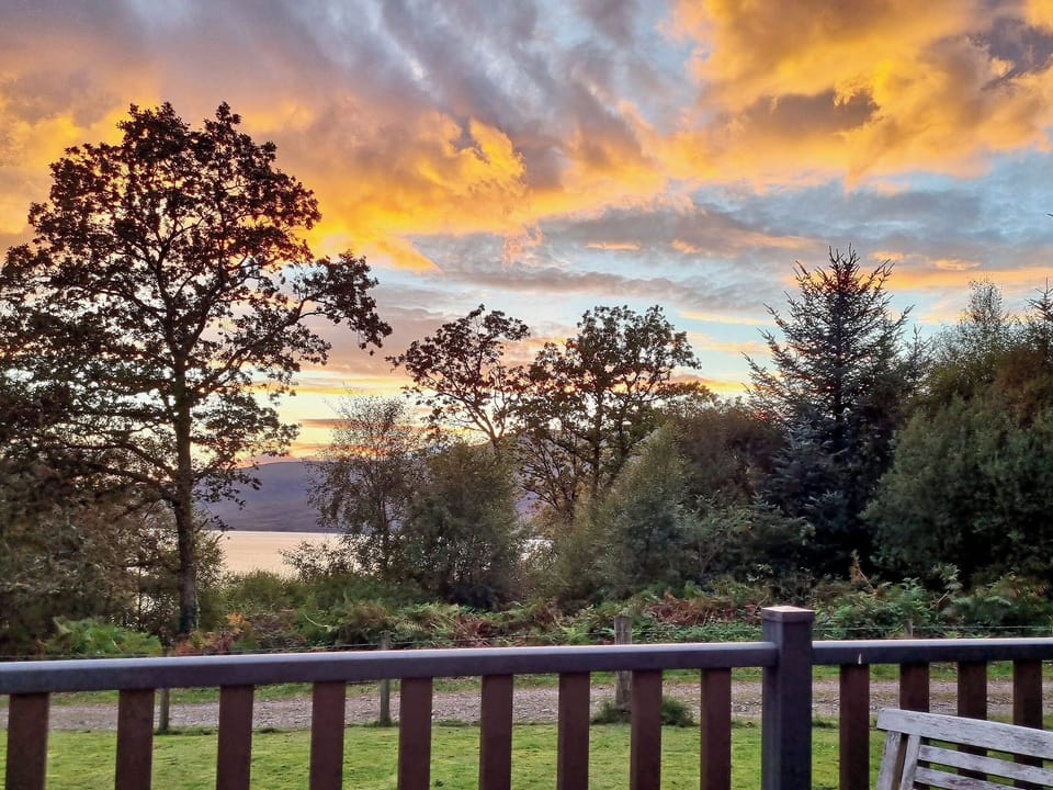 A sunset view from the decked patio area | Allt Beag (Little Streams), Achintraid, near Lochcarron