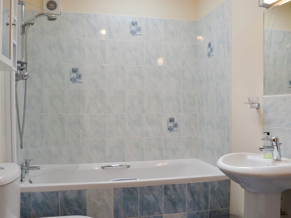 Bathroom with over-bath shower | Peace - East Culkae Cottages, Sorbie, Newton Stewart