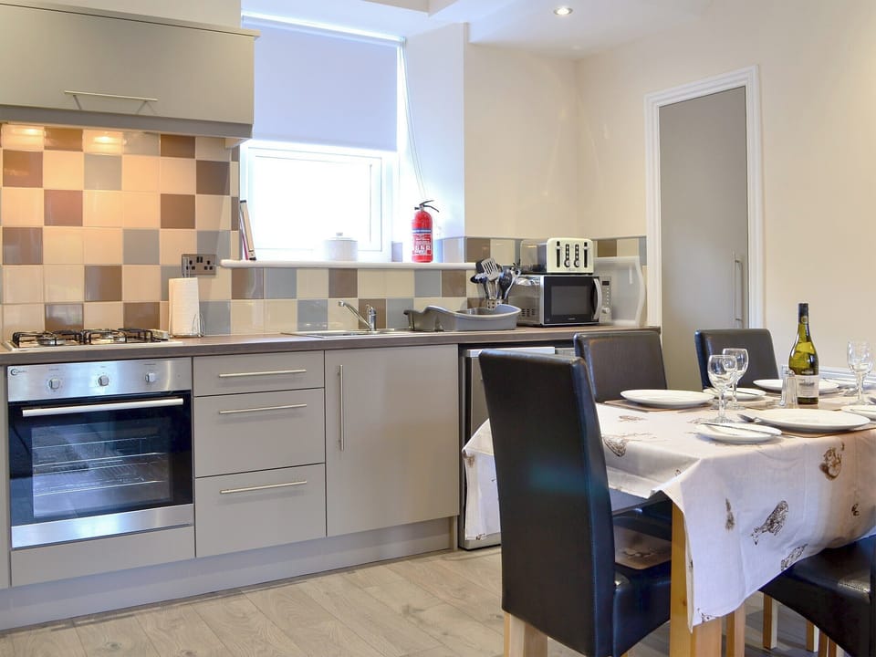 Well equipped kitchen/ dining area | Dovecote House, Wooler