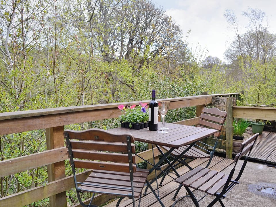 Balcony with outdoor furniture | Larch Cottage, Kirkmichael, near Pitlochry