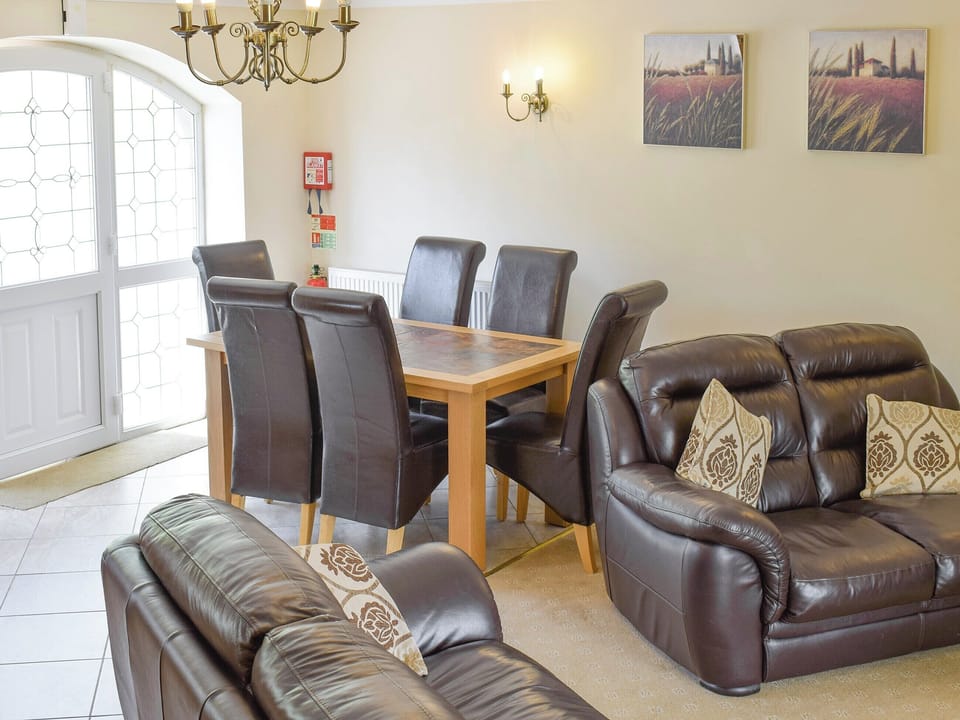 Convenient dining area within open plan designed living space | No 1 Pengraig Draw - Pengraig Cottages, Near Llanfarian