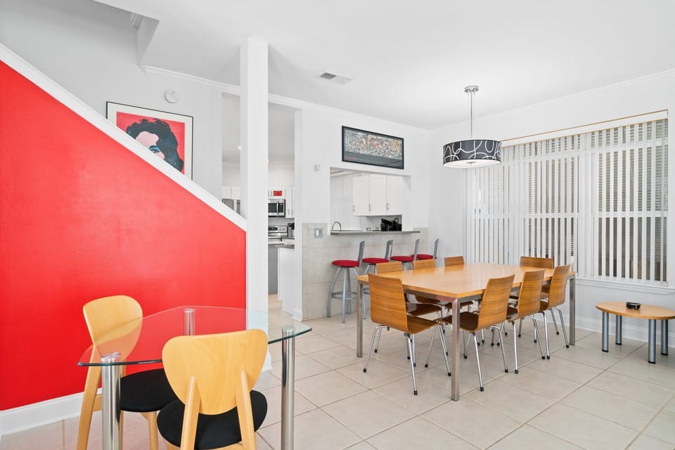Modern dining space for 8 at table; 4 at kitchen bar & 2 at the bistro table.