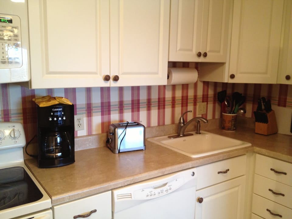 Coffee Pot, Toaster, and plenty of utensils