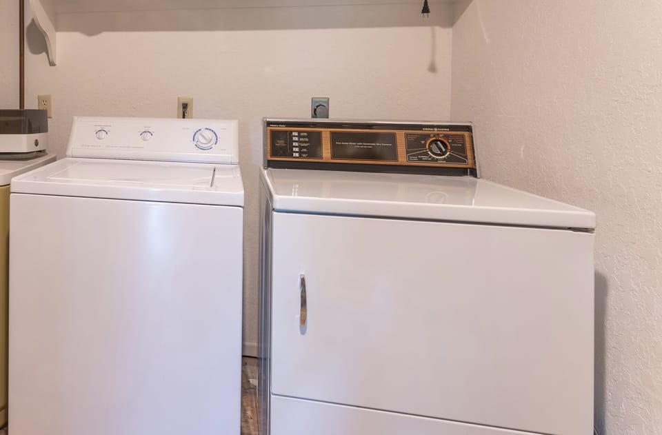 Separate laundry room on lower level available for use.