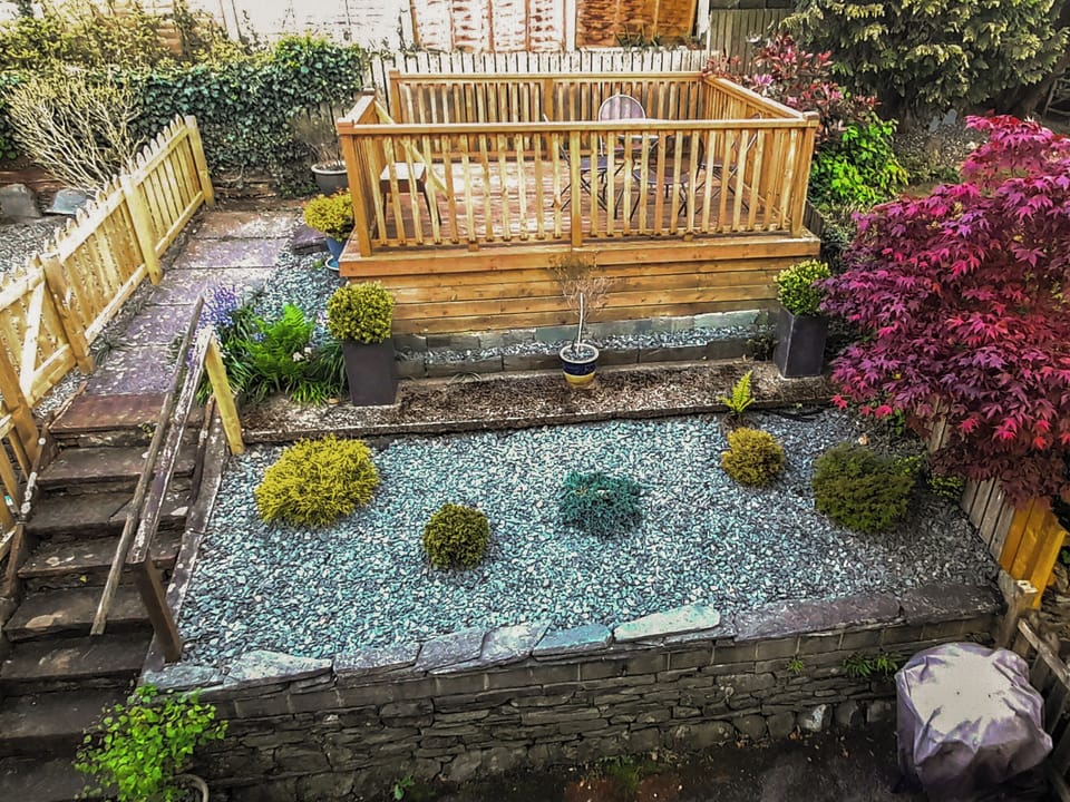 Decked sitting out area | Riverbank Cottage, Keswick