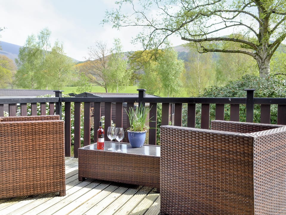 Outdoor furniture on the decked balcony | Fell View Lodge - Burnside Park - Burnside Park, Keswick