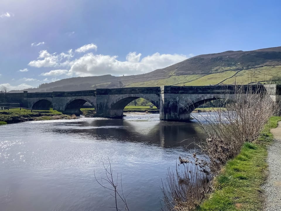 Burnsall Bridge and Fell in the background | Pipit Cottage, Burnsall near Grassington