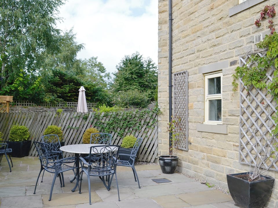 Paved patio area with outdoor furniture | Mickle Hill Mews, Gargrave, near Skipton