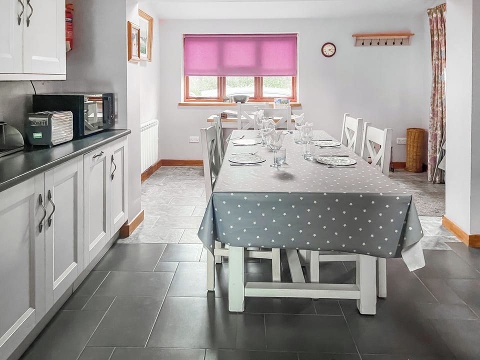 view of dining area from kitchen | Stocks Tree Cottage, Preston Wynne