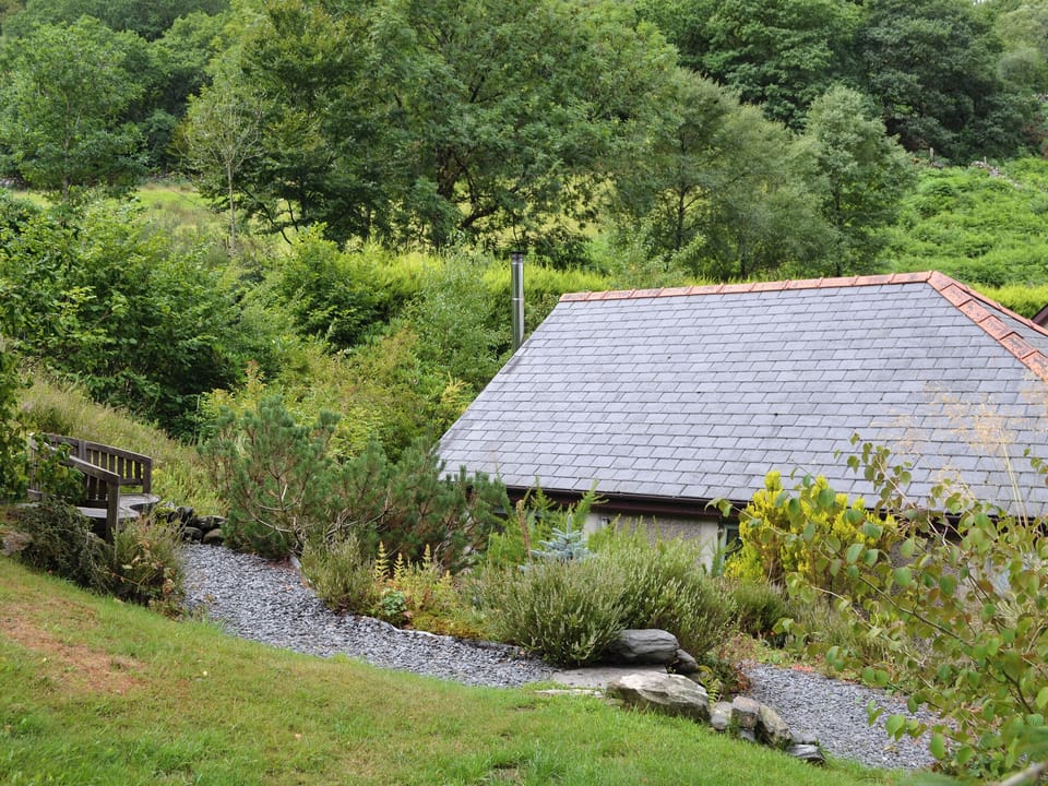 Garden with seating area | Cil Y Felin, Beddgelert, near Caernarfon