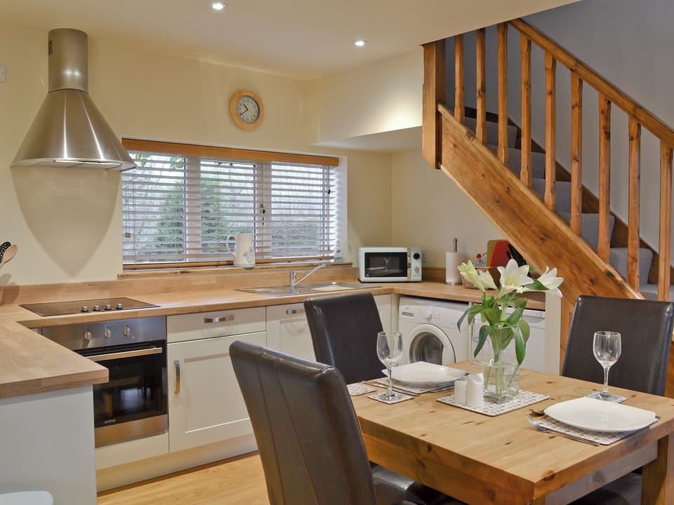 Open plan dining area and kitchen | The Old Coach House, Ulrome near Bridlington