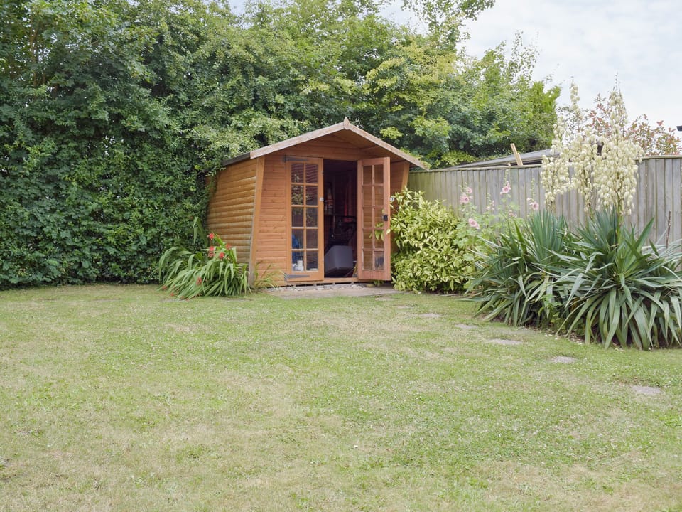 Enclosed lawned garden | Dormers, Leiston