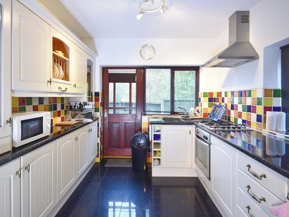 Well appointed kitchen with garden access | South Lodge Cottage, Worthington, near Standish