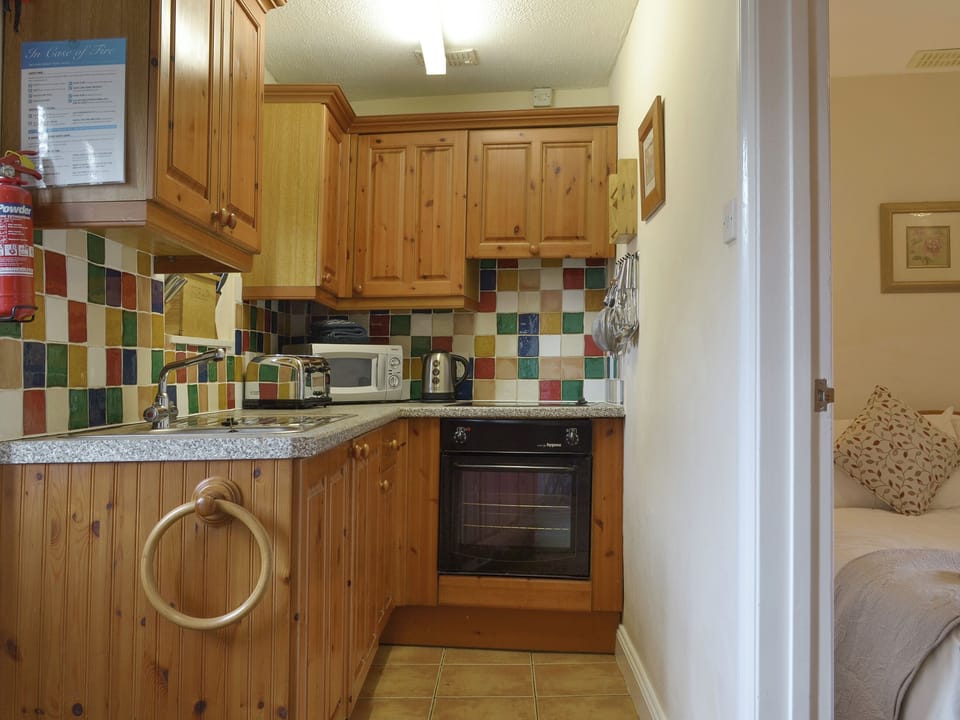 Well-equipped fitted kitchen | Ross Cottage - St Leonards, Polson, nr. Launceston