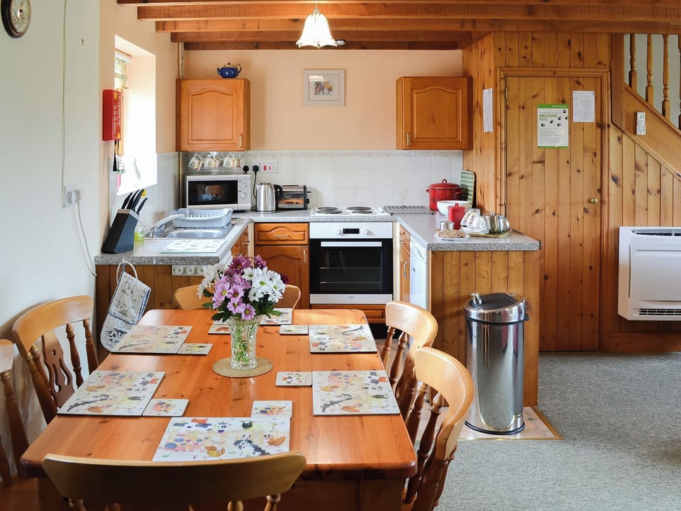 Lovely country-style dining area | Merlin View - Higher Lanvean Farm, St Mawgan, near Newquay