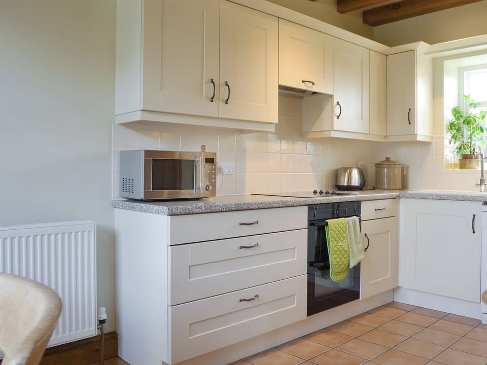 Well-equipped fitted kitchen | Cass Lodge, near Easingwold