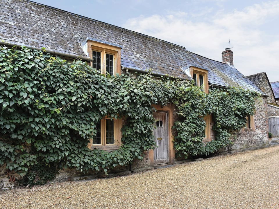 Gorgeous property attached to a historic ivy-clad building | Cerne Abbey Cottage, Cerne Abbas
