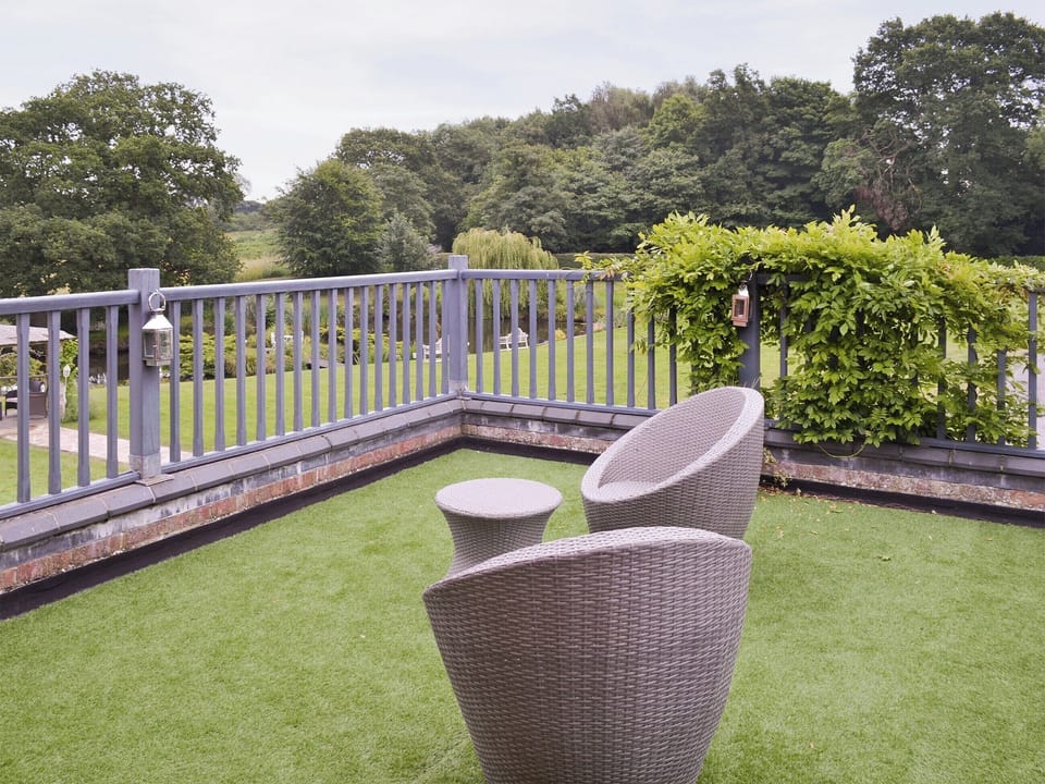 Roof terrace overlooking garden | Buddileigh Farm, Betley, near Nantwich