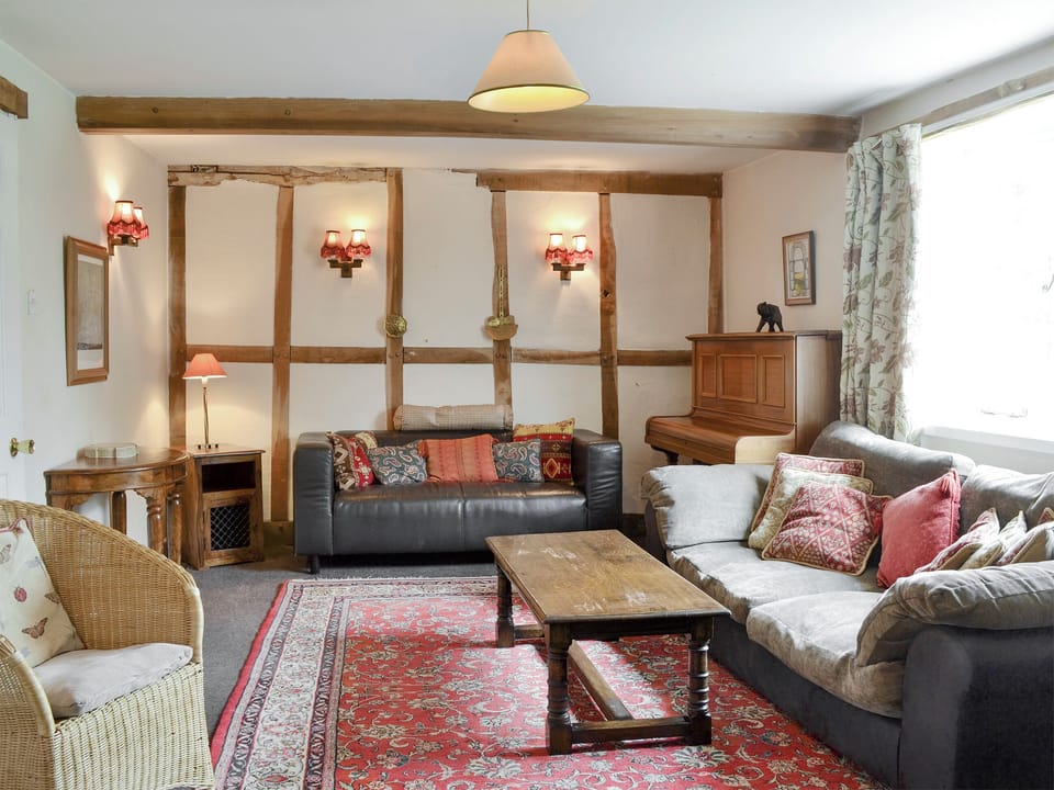 Comfy seating in living room | The Old Granary, Newent, Forest of Dean