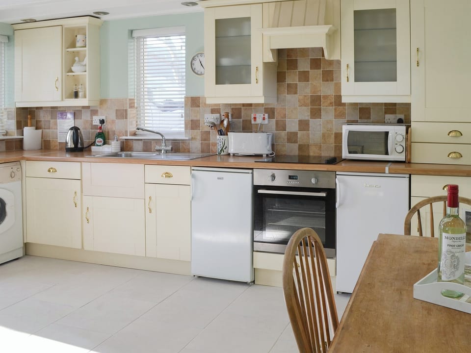 Well equipped kitchen/ dining area | Aidan Cottage, Craster, near Alnwick