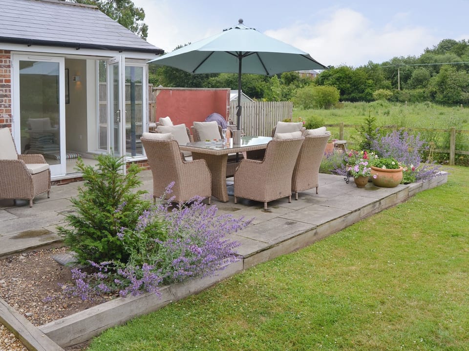 Patio area with outdoor furniture | Lock Cottage, Aylsham