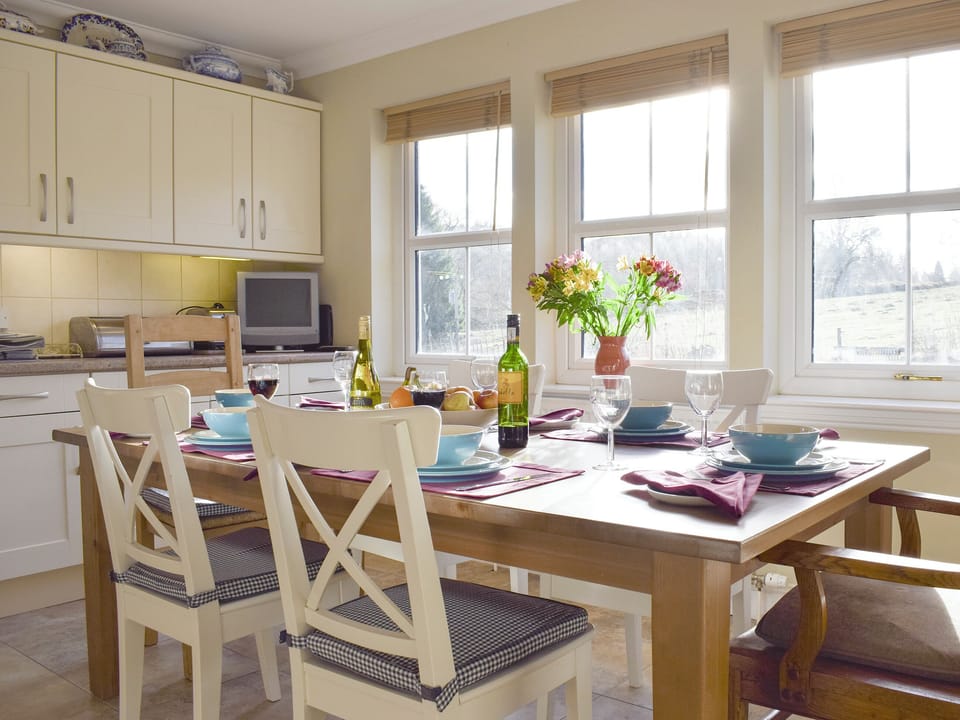 Convenient dining area within kitchen | Heather Croft - Hatton Cottages, Dunkeld, near Pitlochry
