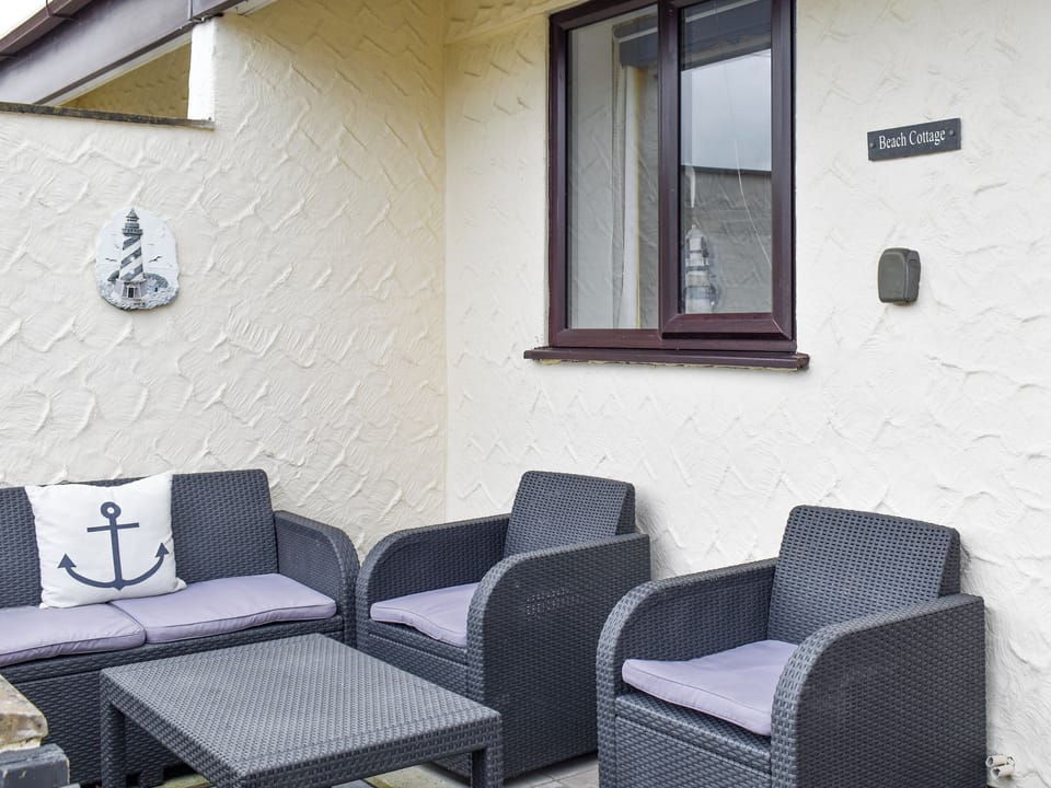 Ground floor enclosed patio area | Beach Cottage, Benllech