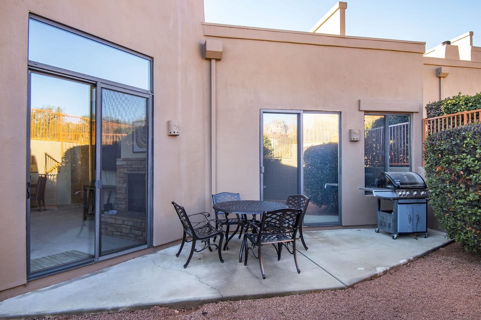 Patio with tables and grill
